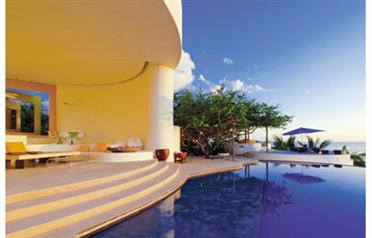 The villa has five bedrooms, six bathrooms, a sparkling pool and impressive ocean views (SUPPLIED)
