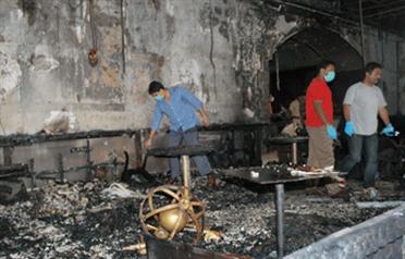 A burnt-out interior of a room in the Taj Palace Hotel in Mumbai. (AP)