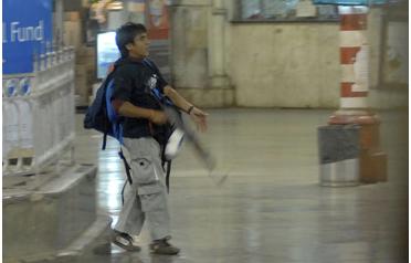 This November 26, 2008 file photo shows gunman Mohammed Ajmal Kasab walking through the Chatrapathi Sivaji Terminal railway station in Mumbai, India. The militant group suspected in the Mumbai attacks is widely believed to have been established by Pakistan's military two decades ago to fight India in the disputed region of Kashmir. (AP) 