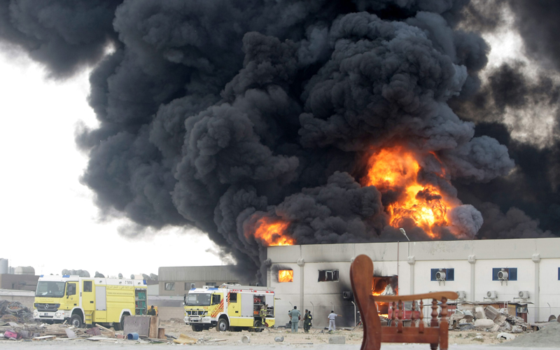 Smoke billows into the sky as flames engulf the National Paints factory in Sharjah, May 11, 2010. (OSAMA ABUGHANIM)