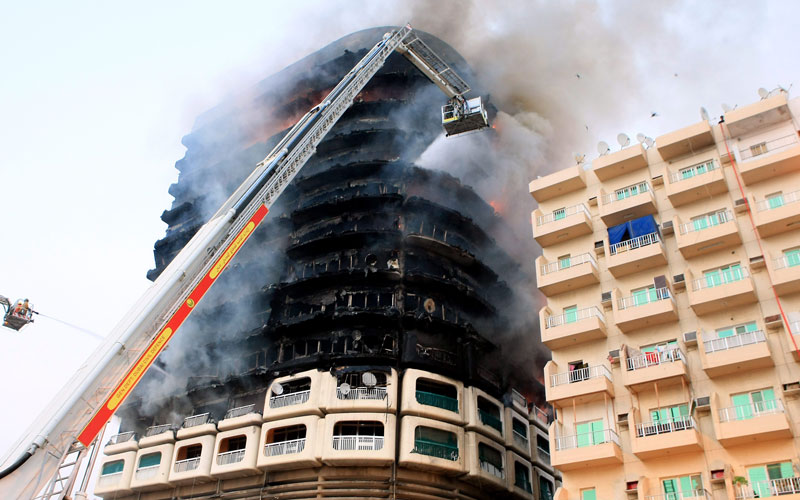 A massive fire broke out in a multi-storey residential building in the Butina area of Sharjah on Tuesday due to the suspected explosion of a cooking gas cylinder. (CHANDRA BALAN)