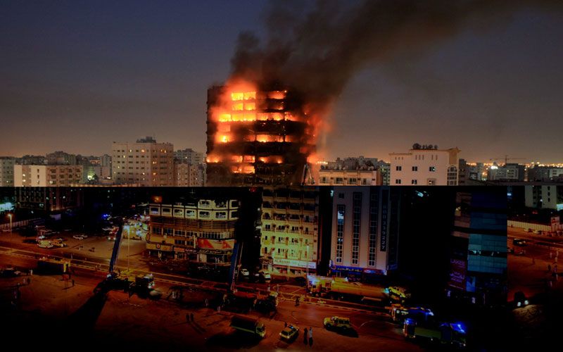 The fire broke out at about 5pm on one of the top storeys of the 15-floor Kuwait Tower building which has 72 flats and spread to other floors. (CHANDRA BALAN)