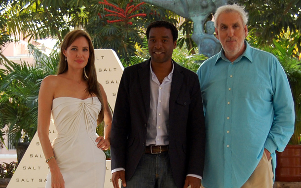 American actress Angelina Jolie, left, British actor Chiwetel Ejiofor, center, and Australian film director Phillip Noyce, pose together during a media event promoting their new movie Salt, in Cancun, Mexico. In the movie, Jolie plays the role of Evelyn Salt, a CIA officer accused of being a Russian spy. (AP)