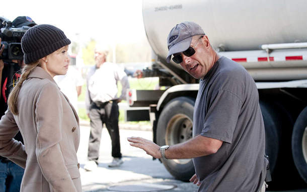 Angelina Jolie with stunt coordinator Simon Crane on the sets of Columbia Pictures' Salt. (SUPPLIED)