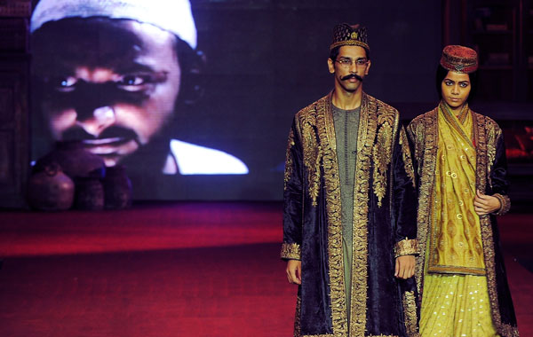 Models present creations by Indian designer Sabyasachi Mukherjee during the Pearls Delhi Couture Week 2010 on Tuesday. (AFP)