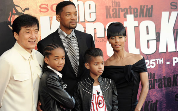(From L to R) Chinese actor and producer Jackie Chan, US actors Jaden Smith and Will Smith, his daughter Willow Smith and his wife Jada Pinkett Smith pose for photographers upon their arrival prior to the premiere of the film "The Karate Kid" at the Grand Rex in Paris. (AFP)
