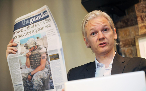 WikiLeaks founder Julian Assange shows an issue of the British daily The Guardian during a press conference at the Frontline Club in London, Britain to discuss about the 75,000 Afghan war documents that the organization made available to The New York Times, The Guardian of London and Germany's Der Spiegel. Documents were published on 25 July. 'There is no perfect information but in the end the truth is all we have,' Assange said. 'We would like to see this material, the revelations that this material gives, taken seriously, investigated by governments and new policies put in place as a result, if not prosecutions of those people that committed abuses.' WikiLeaks says it will publish an additional 15,000 documents once they have been scrubbed of any names that could potentially put people in danger. (EPA)