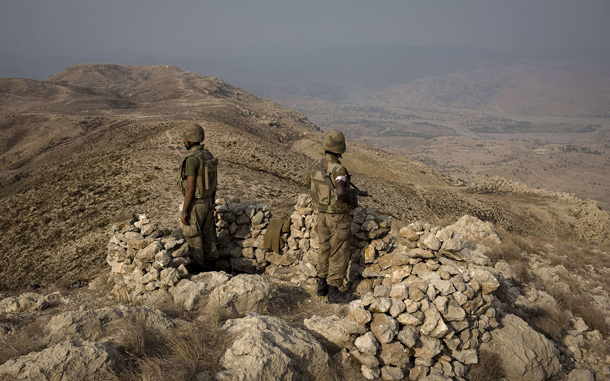 Pakistani soldiers secure an area on top of Kund mountain near the village of Kotkai in South Waziristan. Around 30,000 troops are taking part in the offensive against an estimated 10-12,000 militants in the semi-autonomous and lawless tribal belt. A massive cache of leaked Pentagon documents on the Afghan war highlights the role that Pakistan's intelligence service plays in destabilising Afghanistan, the president's spokesman said. Kabul has long accused Islamabad of providing support and sanctuary for militant groups that plan, fund and carry out attacks in Afghanistan. The whistleblowing website Wikileaks made public 92,000 Pentagon files and field reports about deaths of innocent civilians, Pakistani agents meeting the Taliban and Iran secretly furnished it with money, arms and training. (AFP)