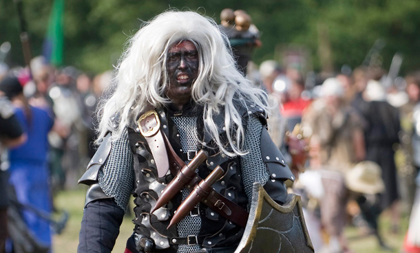 A man in costume participates in "Conquest 2010 LARP" (Live Action Role Play) in the northern German village of Brokeloh near Hanover. About 7000 participants from Europe, the United States and Japan dressed up as fantasy characters such as knights and trolls to take part in the three-day role playing event. (REUTERS)