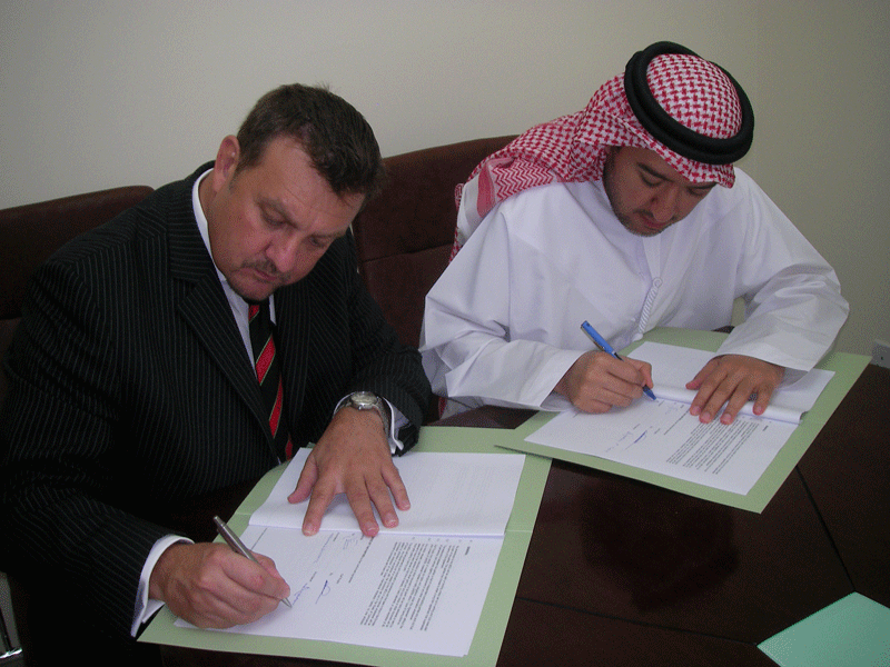 AGRFU chairman Andy Cole (left) and UAERA chairman Mohammed Abdulrahman Falaknaz get set for a new partnership. (SUPPLIED)
