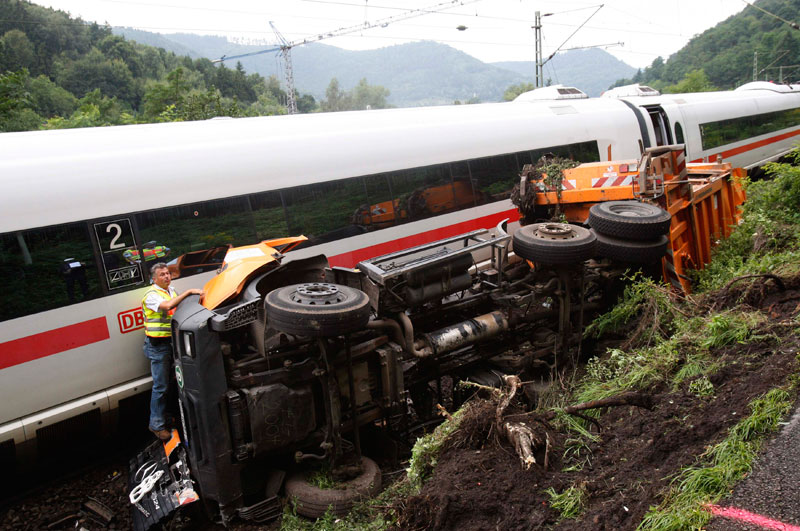 The destroyed and derailed Frankfurt-Paris InterCityExpress (ICE) highspeed train of German railway operator Deutsche Bahn AG is seen after a crash with a garbage truck in Lindenberg near Neustadt an der Weinstrasse. (REUTERS)