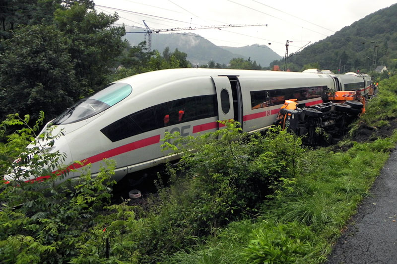 An InterCityExpress train and an overturned garbage truck after an accident near Lambrecht, Germany. (AP)