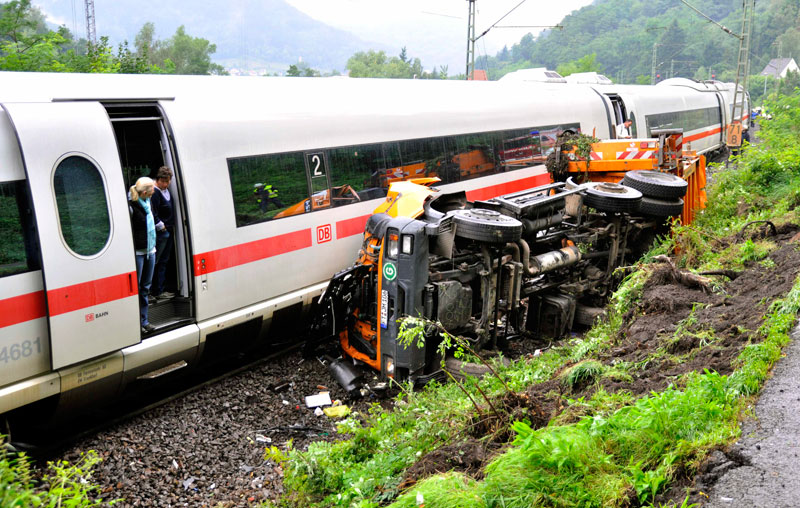 Passengers look out of a InterCityExpress train after an accident near Lambrecht, Germany. (AP)