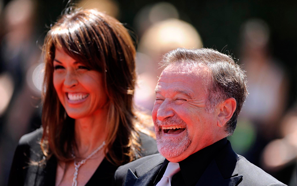 US actor Robin Williams (R) and Susan Schneider (L) arrive for the Primetime Creative Arts Emmy Awards in Los Angeles, California, USA. The Primetime Creative Arts Emmy Awards honors excellence in television technical categories such as makeup, editing and cinematography. (EPA)
