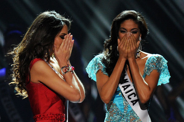 Miss Mexico Jimena Navarrete (L) waits with runner-up Miss Jamaica Yendi Phillips (R) as she is announced as the winner of the Miss Universe 2010 at the Miss Universe 2010 Pageant Final at the Mandalay Bay Hotel in Las Vegas. (AFP)