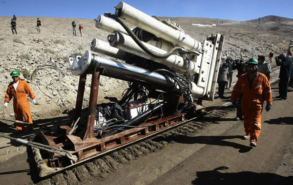 Power drill Raisebore Strate 950, which will drill the hole to rescue 33 miners trapped, is moved in the San Jose deposit, at the Atacama desert, 80 kilometers far from Copiapo, Chile. (EPA)