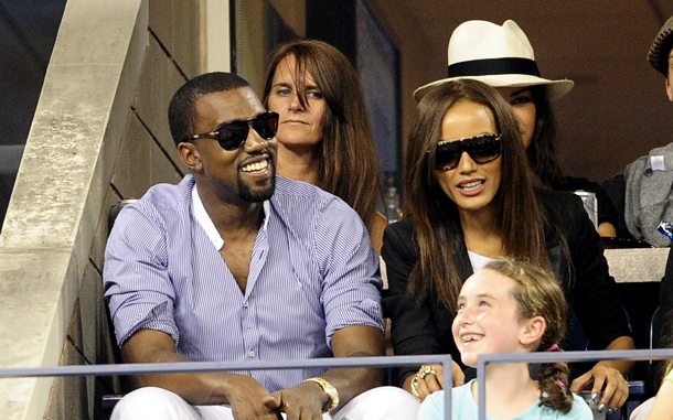 US singer Kenye West (L) watches US tennis player Andy Roddick against Serbia's Janko Tipsarevic, during their second round match at the 2010 US Open tennis tournament in New York. (AFP)