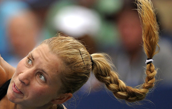 Alona Bondarenko of the Ukraine plays against Francesca Schiavone of Italy (6) during their US Open 2010 match at the USTA Billie Jean King National ennis Center in New York. (AFP)