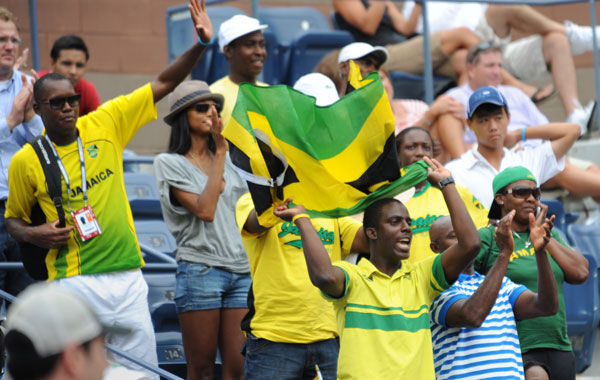 Friends and family of Dustin Brown of Jamaica cheer after match with Andy Murray of Britain at the US Open 2010 tennis tournamen in New York. Murray won, 7-5, 6-3, 6-0. (AFP)