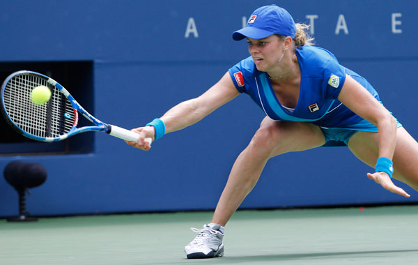 Kim Clijsters of Belgium returns the ball to Petra Kvitova of Czech Republic at the U.S. Open tennis tournament in New York. (AP)