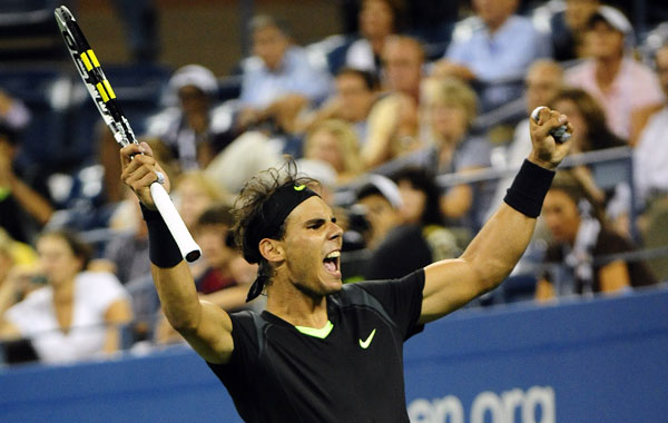 Spanish tennis player Rafael Nadal celebrates after winning against Uzbekistan's Denis Istomin, during their second round match at the 2010 US Open tennis tournament in New York. Nadal won 6-2, 7-6, 7-5. (AFP)