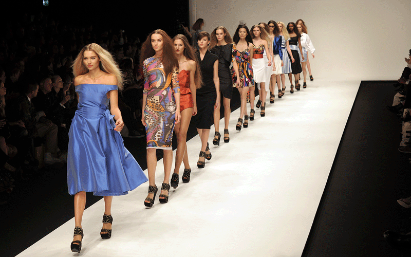 Models walk down the catwalk wearing clothes by PPQ for the Spring/Summer 2011 collection on the first day of London Fashion Week, in London. (AFP)