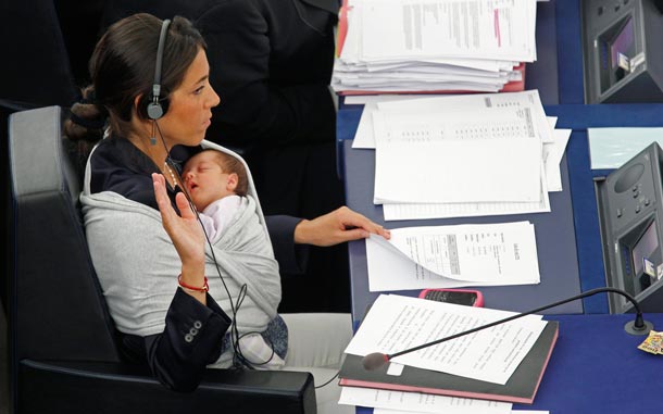 Italy's Member of the European Parliament Licia Ronzulli takes part with her baby in a voting session at the European Parliament in Strasbourg. (REUTERS)