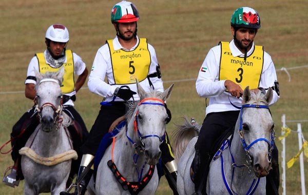 Sheikh Hamdan bin Mohammed Al Maktoum (3) of the United Arab Emirates riding Sas Alexis leads compatriot Sheikh Majid bin Mohammed Al Maktoum (5) riding Kangoo D'Aurabelle and Faleh Nasser Bughenaim (92) of Qatar riding Amir competing in the World Endurance Championship at the World Equestrian Games in Lexington, Kentucky. (REUTERS)