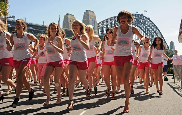 A competitor runs during a heat of the "Venus Embrace Closest Stiletto Relay" in Sydney. (AFP)