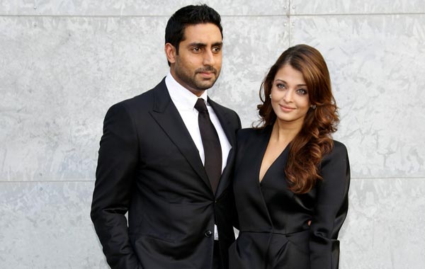 Aishwarya Rai and Abhishek Bachchan attend the Giorgio Armani Spring/Summer 2011 fashion show during Milan Fashion Week Womenswear. (GETTY IMAGES)