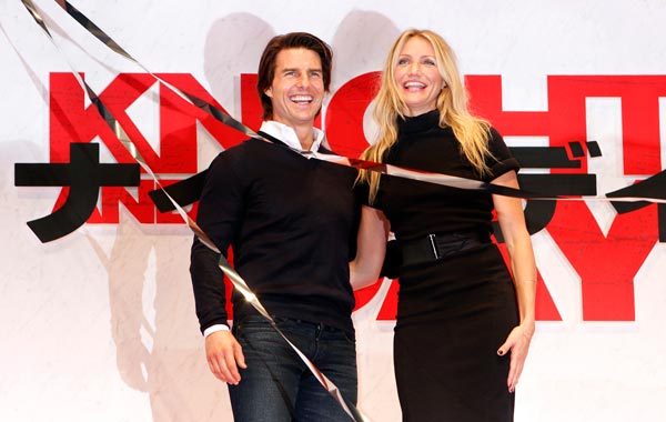 Tom Cruise, left, and Cameron Diaz smile at the Japan Premiere of 'Knight and Day' in Tokyo, Japan. (AP)