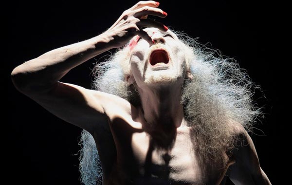 Japanese butoh dancer Daisuke Yoshimoto performs during the concert 'Osjan and Guests' at the sixth Cross-Culture Warsaw Festival, in Warsaw, Poland. (EPA)