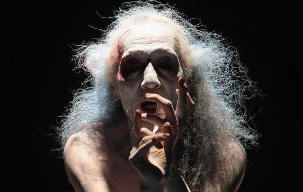 Japanese butoh dancer Daisuke Yoshimoto performs during the concert 'Osjan and Guests' at the sixth Cross-Culture Warsaw Festival, in Warsaw, Poland. (EPA)