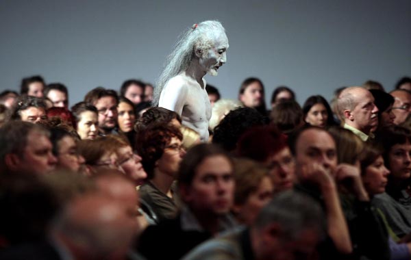 Japanese butoh dancer Daisuke Yoshimoto performs during the concert 'Osjan and Guests' at the sixth Cross-Culture Warsaw Festival, in Warsaw, Poland. (EPA)