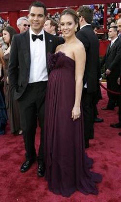 Actress Jessica Alba, dressed in Marchesa, and her boyfriend, Cash Warren, arrive at the 80th annual Academy Awards, the Oscars, in Hollywood. (REUTERS)