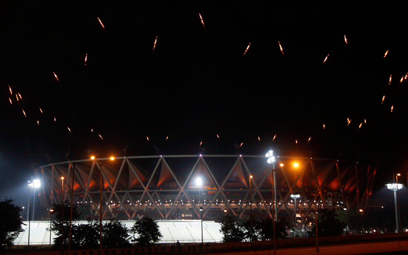 Pyrotechnics go off during the opening ceremony for the 19th Commonwealth Games at the Jawaharlal Nehru stadium in New Delhi. (AP)