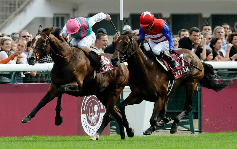 Ryan Moore riding Workforce (left) wins The Qatar Prix de l'arc de Triomphe from Nakayama Festa at the Hippodrome de Longchamp in Paris. (GETTY)