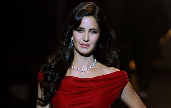 Bollywood actress Katrina Kaif walks the ramp during a fashion show for actor Salman Khan's "Being Human" foundation, on the fourth day of the HDIL India Couture Week in Mumbai. (AFP)