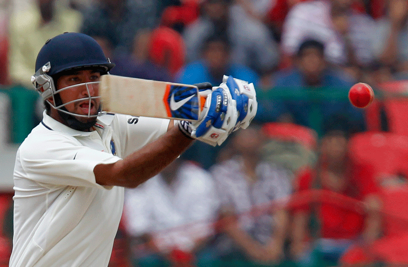 India’s Cheteshwar Pujara became the fifth Indian to make a half century on Test debut in the second innings. (REUTERS)