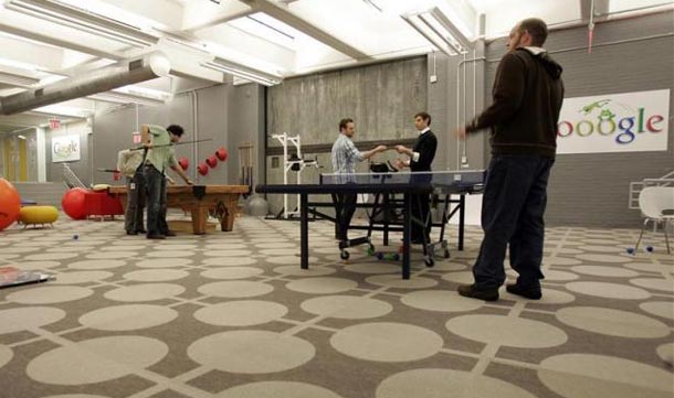 Google employees play pool and ping pong in the Game Room at the New York City company office. (REUTERS)