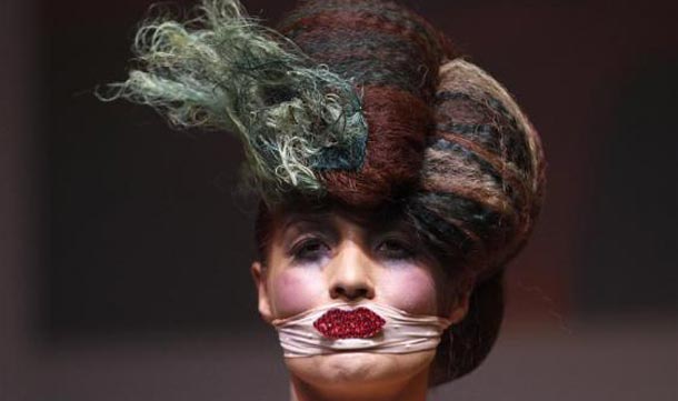 A model displays a creation during the Alternative Hair Show at the Grand Temple, Freemason's Hall in central London. (REUTERS)