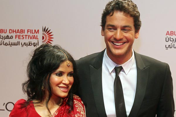 Bollywood actress Nandana Sen and Egyptian actor Khaled Abul Naga pose on the red carpet upon their arrival to attend the closing ceremony of the Abu Dhabi International Film Festival in the Emirati capital. (AFP)