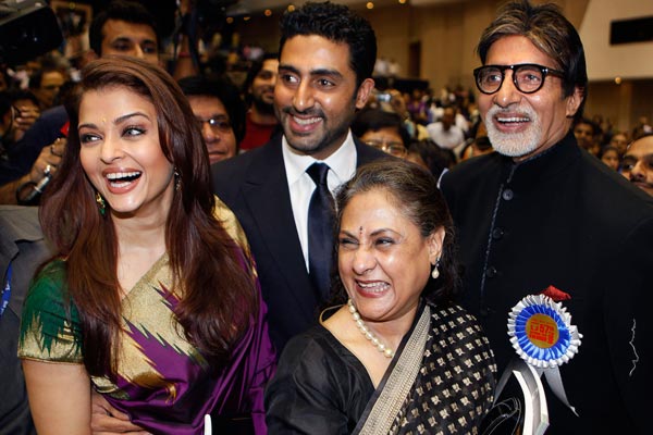 Bollywood actor Amitabh Bachchan, right, poses with his family members, from left, daughter-in-law Aishwarya Rai Bachchan, son Abhishek Bachchan and wife Jaya Bachchan, after receiving the award for the best actor during the 57th National Film Award ceremony, in New Delhi, India. (AP)