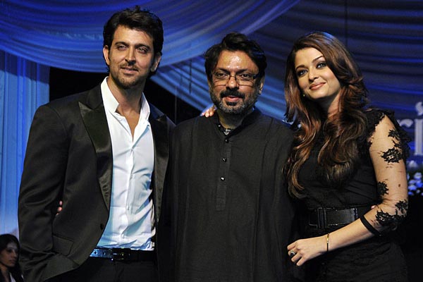 Indian Bollywood film actors and cast members Hrithik Roshan (L) and Aishwarya Rai Bachchan (R) attend a musical evening featuring the soundtrack of upcoming Hindi film “Guzaarish” by Bollywood film director Sanjay Leela Bhansali (C) in Mumbai. (AFP)