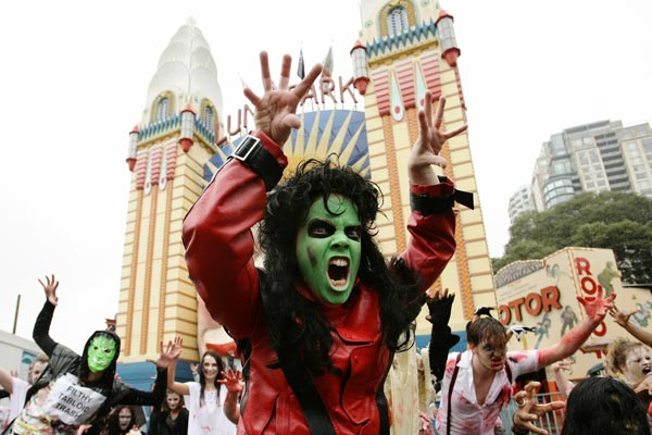 Michael Jackson fans dressed as zombies perform during Thrill The World 2010 at Luna Park in Sydney, Australia. (GETTY)