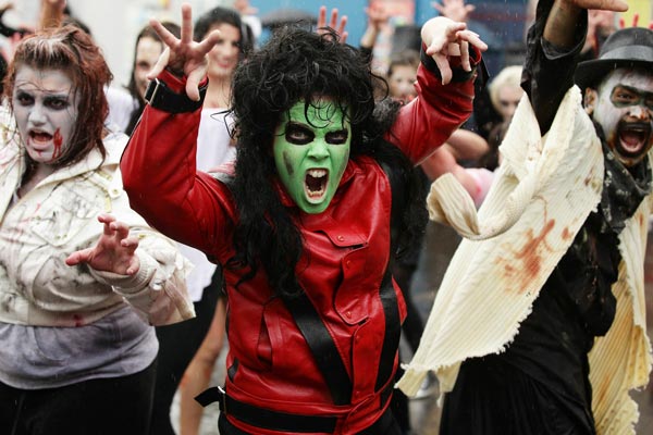 Michael Jackson fans dressed as zombies perform during Thrill The World 2010 at Luna Park in Sydney, Australia. (GETTY)