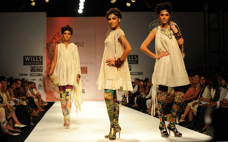 Models display creations of Indian designer Kavita Bhartia during The Wills Lifestyle India Fashion Week - Spring Summer 2011 at Pragati Maidan in New Delhi. (AFP)
