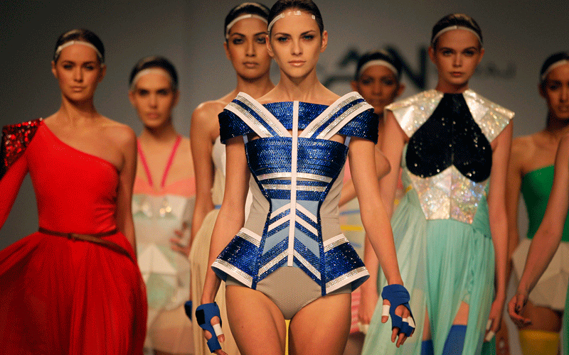 Models present creations by Alpana and Neeraj at the Wills Lifestyle India Fashion Week in New Delhi, India. (AP)