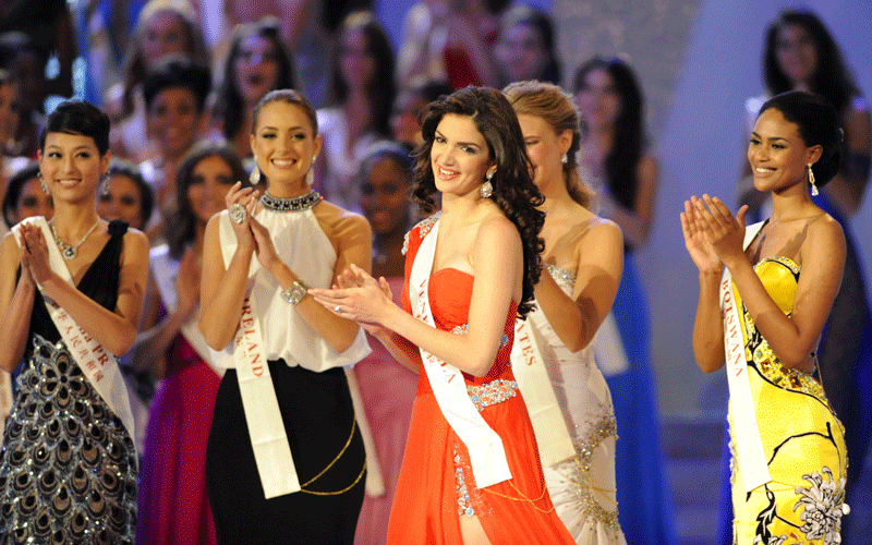 Miss Venezuela Adriana Vasini (front) smiles as she is announced the third placed winner during the Miss World 2010 Beauty Pageant finals at the Beauty Crown Theatre in the southern Chinese resort town of Sanya. (AFP)