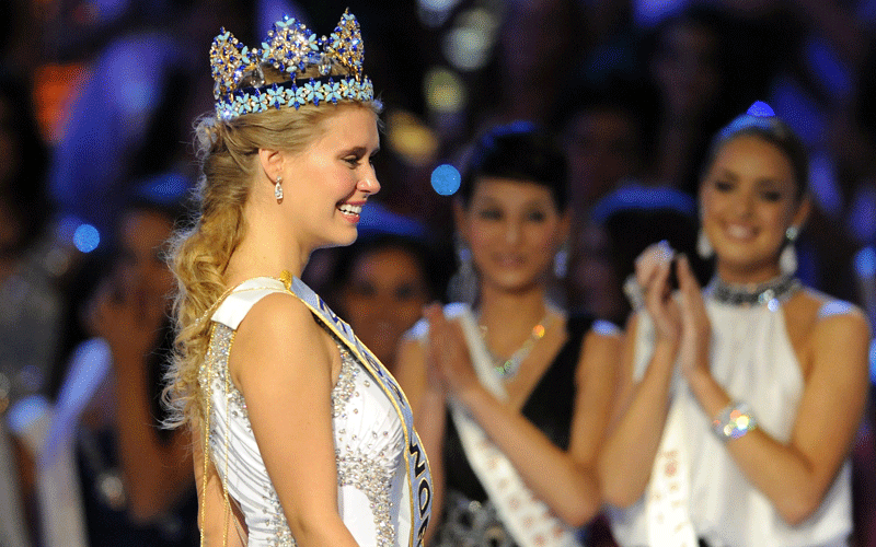 Alexandria Mills of the US celebrates as she crowned as the 2010 Miss World during the Miss World 2010 Beauty Pageant finals at the Beauty Crown Theatre in the southern Chinese resort town of Sanya. (AFP)